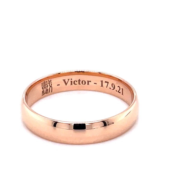 Alliances gravées en or rose avec des diamants, fabriquées sur mesure dans une bijouterie près des Monts d'Or