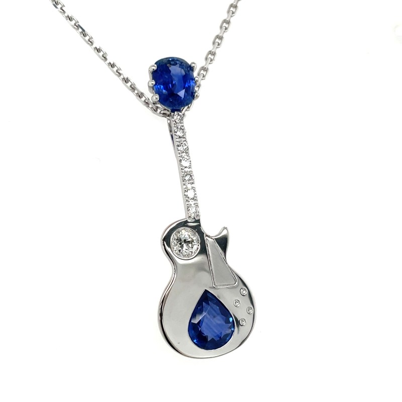 pendentif guitare or 18 carats bijoux personnalisé femme fabrication artisanale par un joaillier a Villefranche