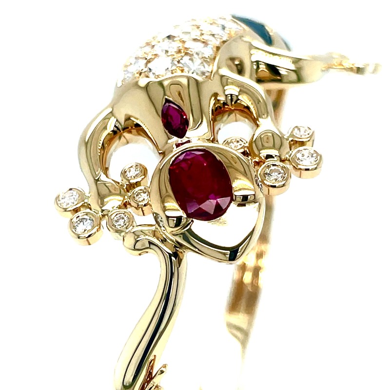 Bracelet en or jaune et pierres précieuses en forme de Salamandre un bijou unique à Villefranche sur Saône proche de Lyon